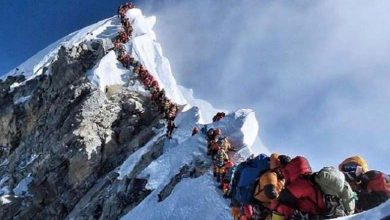 Par photos... "Everest" vu du plus grand dépotoir de déchets au monde 